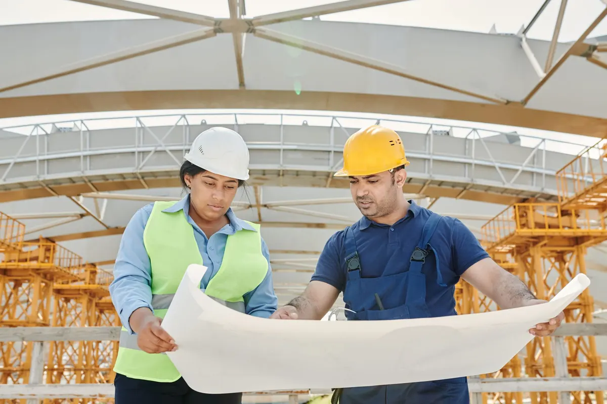 Engineers reviewing drawings on site