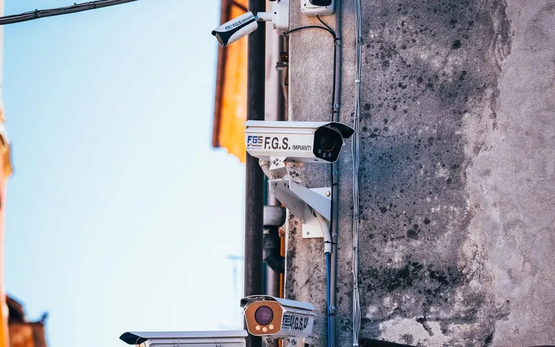 Security cameras mounted on a commercial building